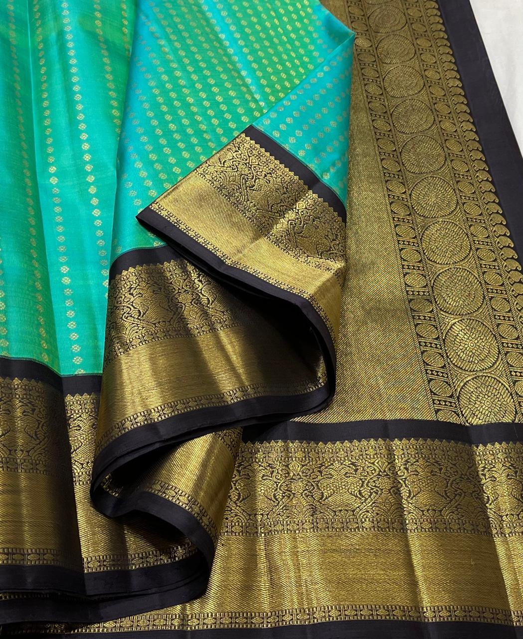 LITE TORQUISE GREEN/BLACK  COLOUR  ZARI BORDER COMBITION PURE KANCHI SILK SAREE